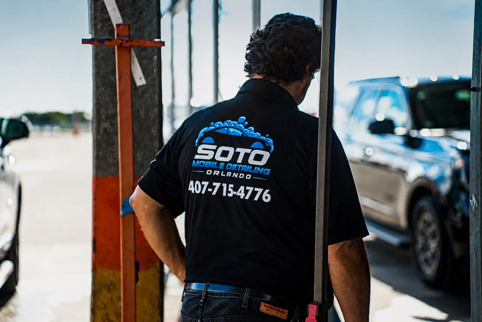 Mobile detailing company in Orlando, FL · canopy shading a vehicle during an exterior detail