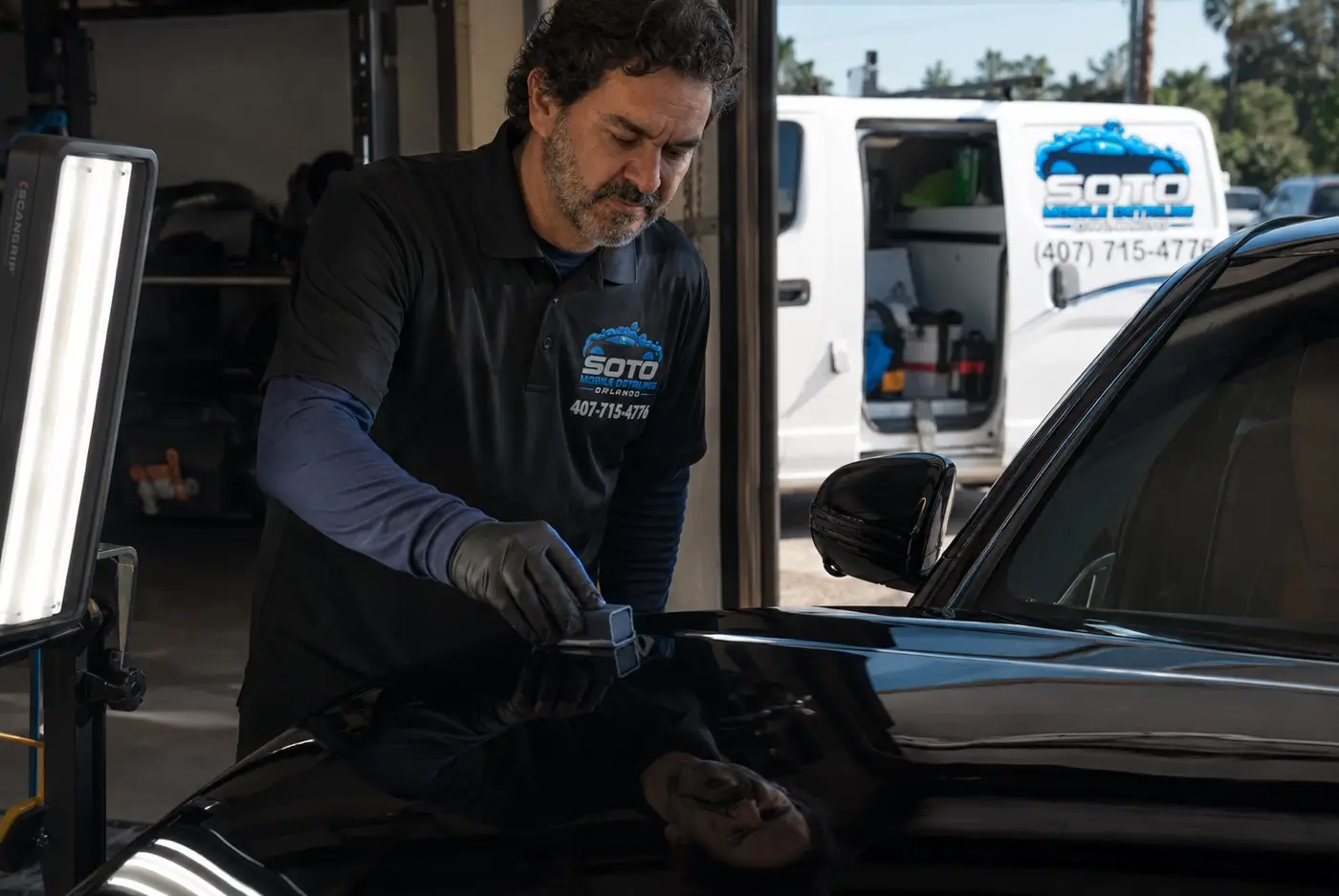 Ceramic coating in Orlando, FL · services section Ceramic coating in Orlando, FL · ceramic coating being applied panel by panel