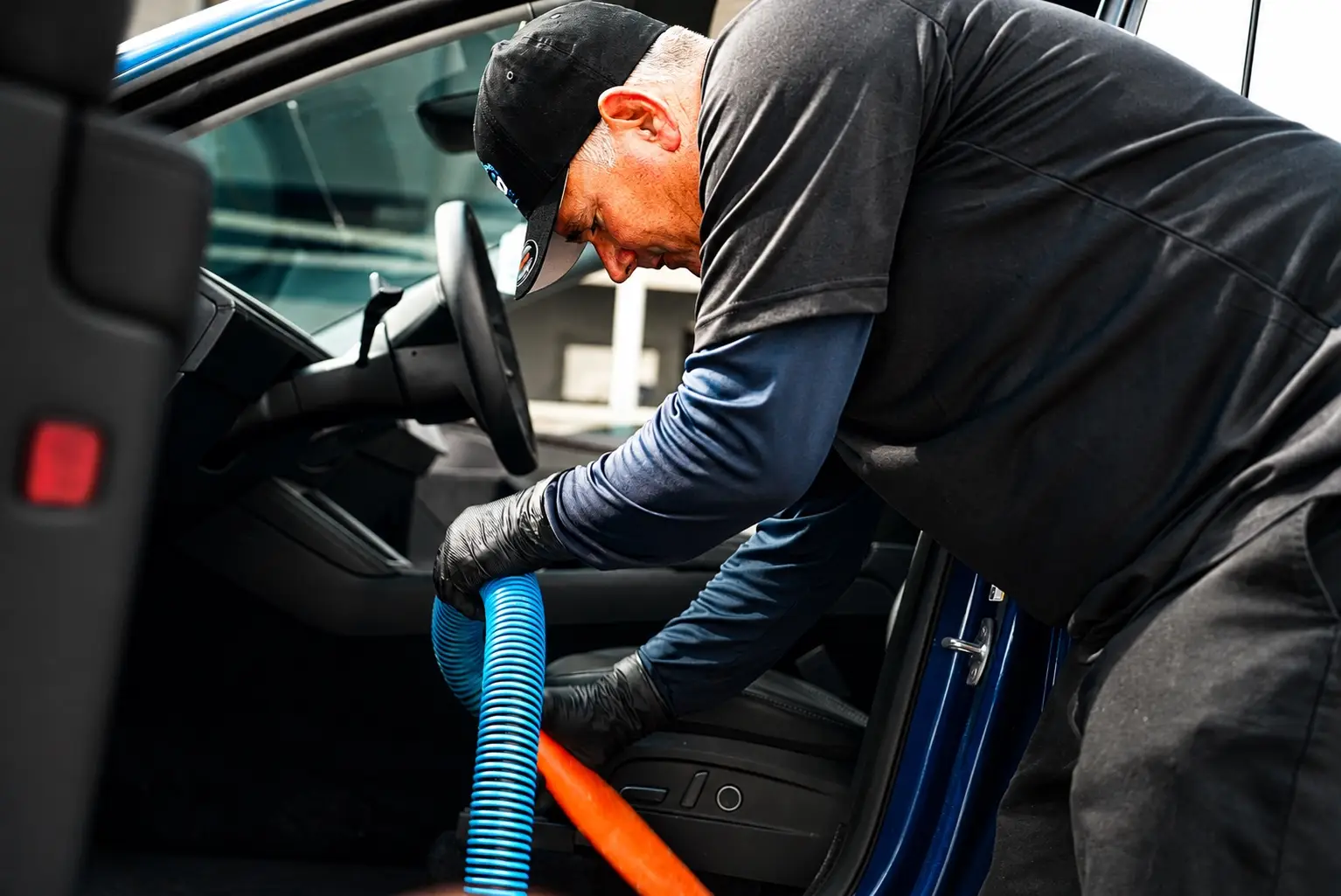 Mobile detailing company in Orlando, FL · hot-water extractor pulling dirt out of the carpet