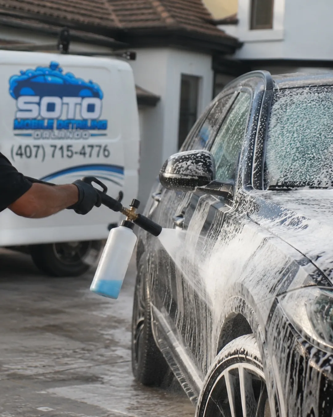 Exterior detailing in Orlando, FL · foam pre-wash on an SUV in a home driveway