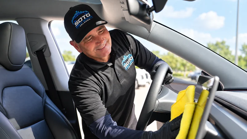 Interior Revival · Deep Interior Detailing in Orlando · Soto detailer wiping the dashboard and interior trim