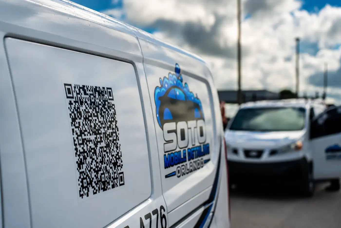 Soto van with the QR code and the Soto Mobile Detailing Orlando logo